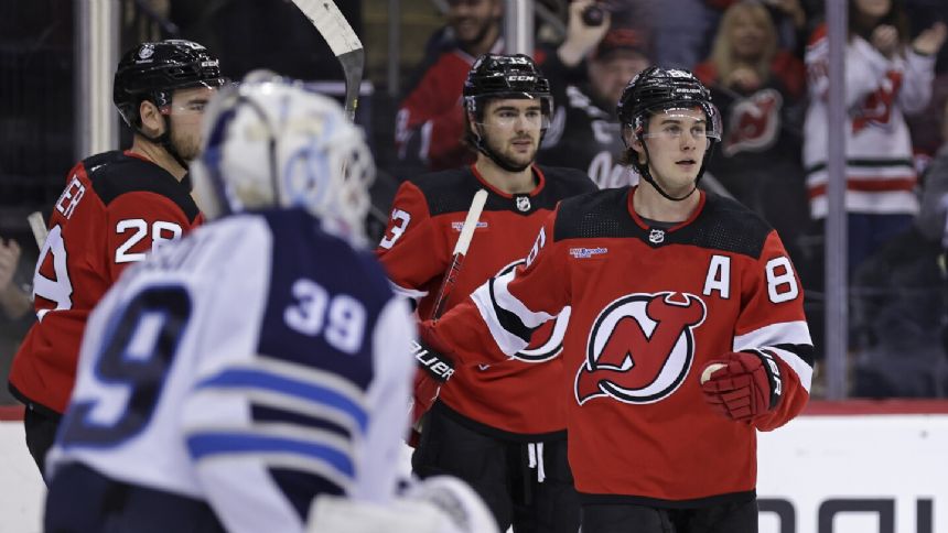 Jack Hughes scores 2, brother Luke has 3 assists as Devils stuns Jets 4-1
