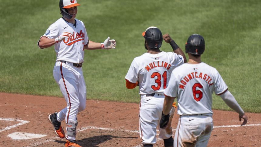 Jackson Holliday's grand slam lifts the Orioles to a 10-4 victory over the Blue Jays