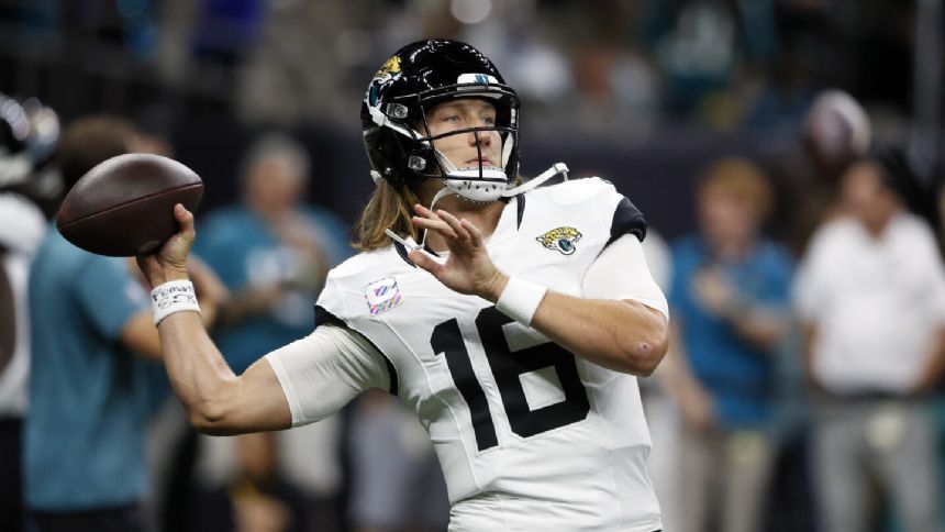 Jaguars QB Trevor Lawrence starts against the Saints despite his knee ...