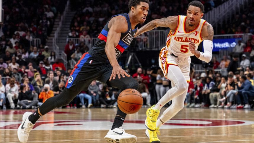 Jalen Johnson has 28 points, 14 rebounds, Hawks clinch play-in berth with 121-113 win over Pistons