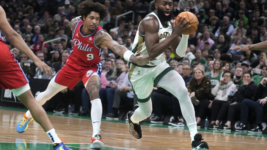 Jaylen Brown scores 31, Celtics pull away in fourth to beat 76ers 117-99