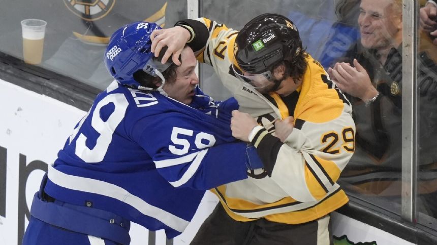 Jeremy Swayman makes 28 saves, Bruins beat weary Maple Leafs 4-1 for 20th home victory