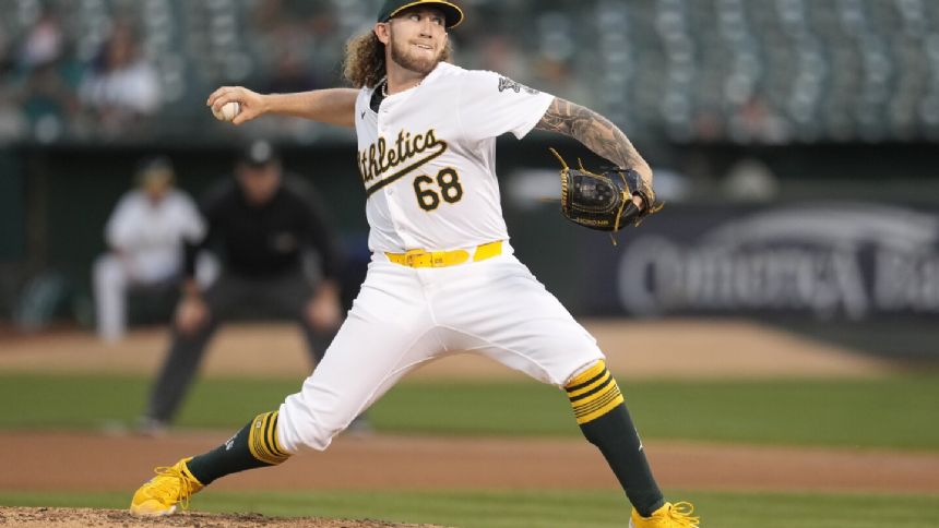 Joey Estes takes perfect game into 7th, Athletics beat Mariners 2-1