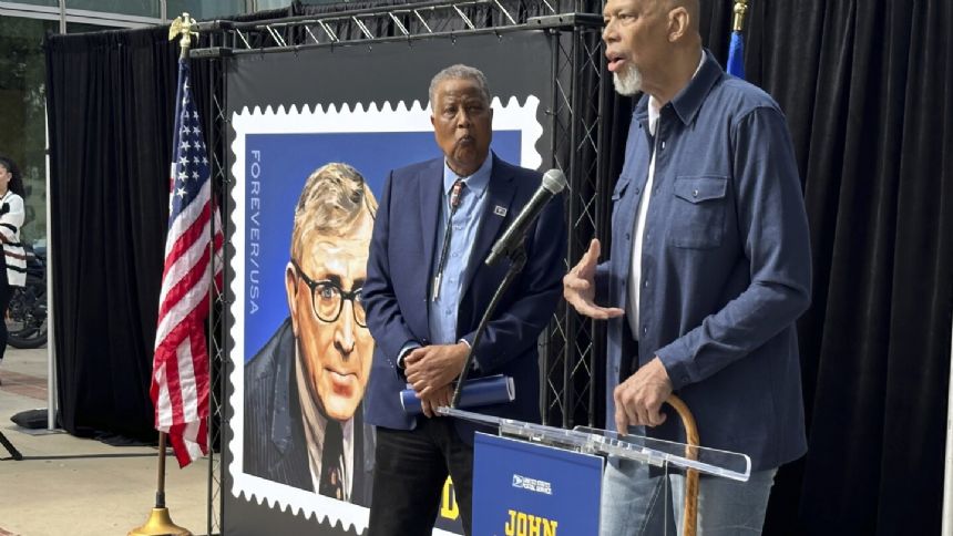 John Wooden stamp unveiled at UCLA honoring the coach who led Bruins to a record 10 national titles