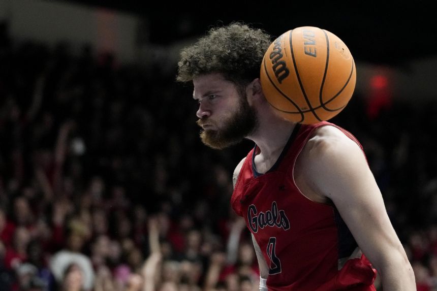 Johnson scores 27 to lead No. 17 Saint Mary's past BYU 71-65