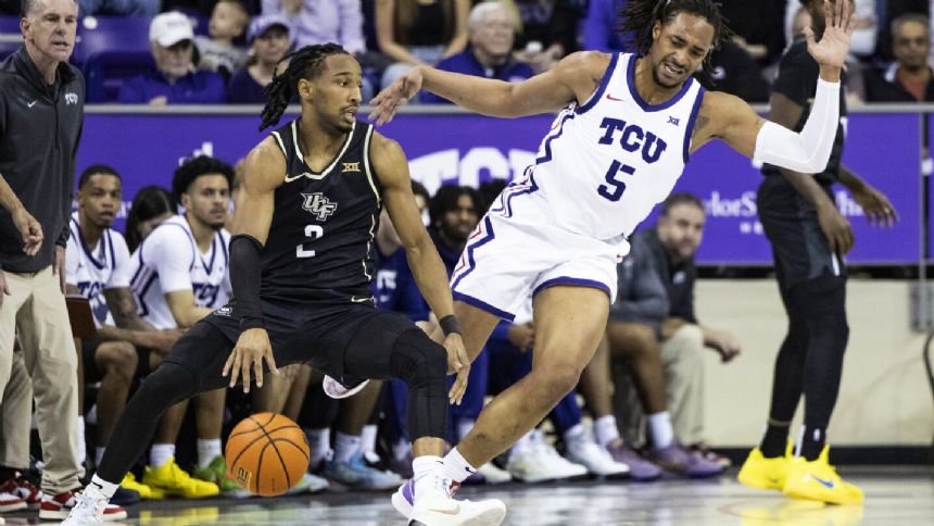 Johnson scores career-high 33 points, UCF holds off TCU 79-77