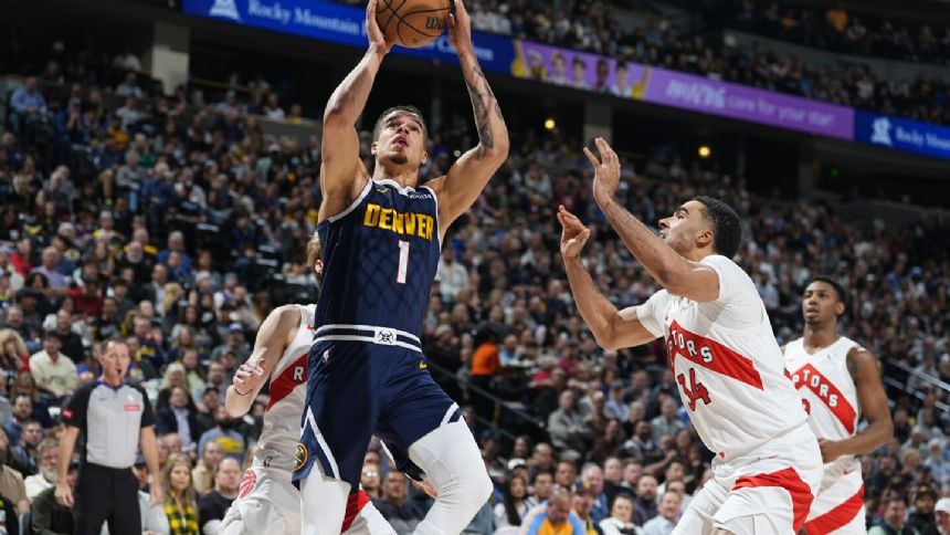 Jokic has 21st triple-double to rally Nuggets past depleted Raptors, 125-119