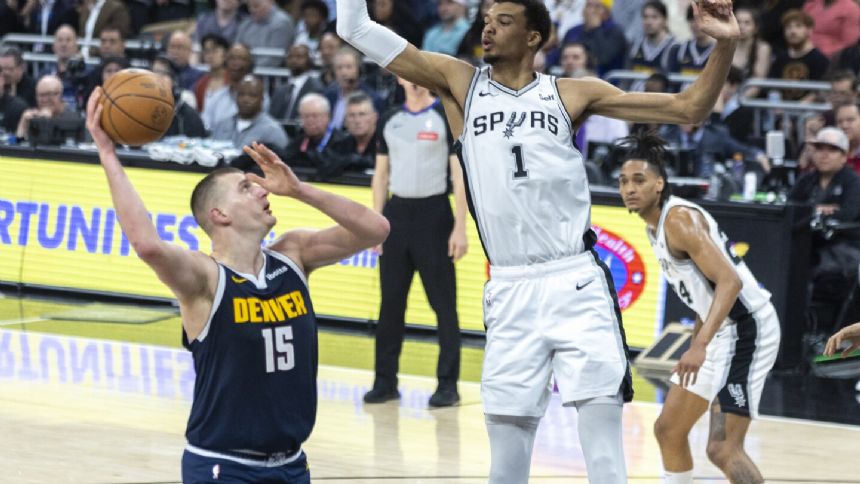 Jokic scores 31, Nuggets top Spurs 117-106 in front of record crowd in Texas' capital city