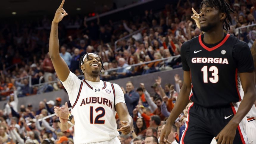 Jones hits 7 3s, No. 13 Auburn beats Georgia 92-78 to earn SEC double bye