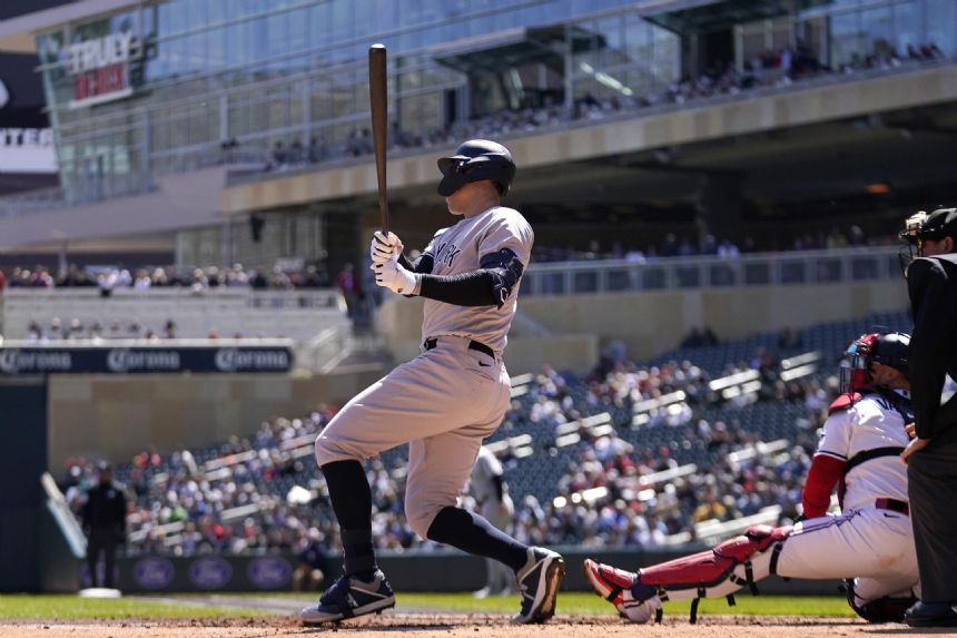 Judge drives in 3, helps Yanks avoid sweep at Twins