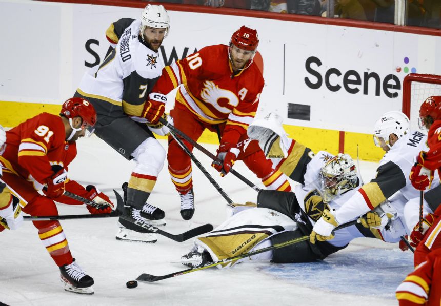 Kadri's 3-point game powers Flames to 4-1 win over Penguins