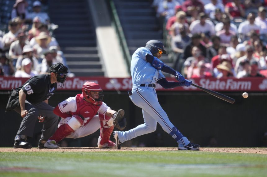 Kiermaier, Chapman both drive in 5, Jays beat Angels in 10