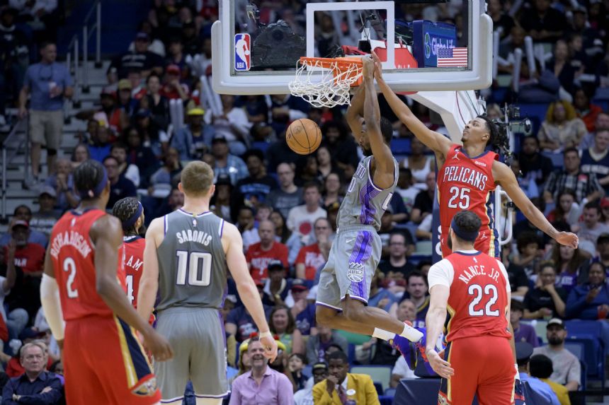 Kings beat Pelicans 121-103 to clinch Pacific Division title