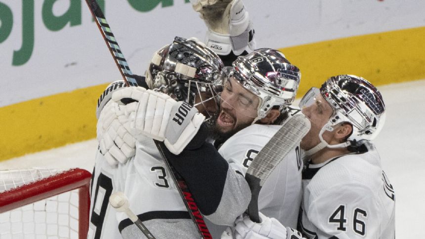 Kings blank Canadiens 4-0, set the NHL record with their 11th straight road win to open season