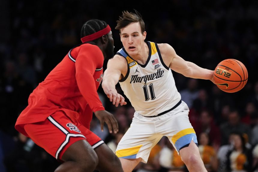 Kolek rallies No. 6 Marquette past pesky St. John's in OT