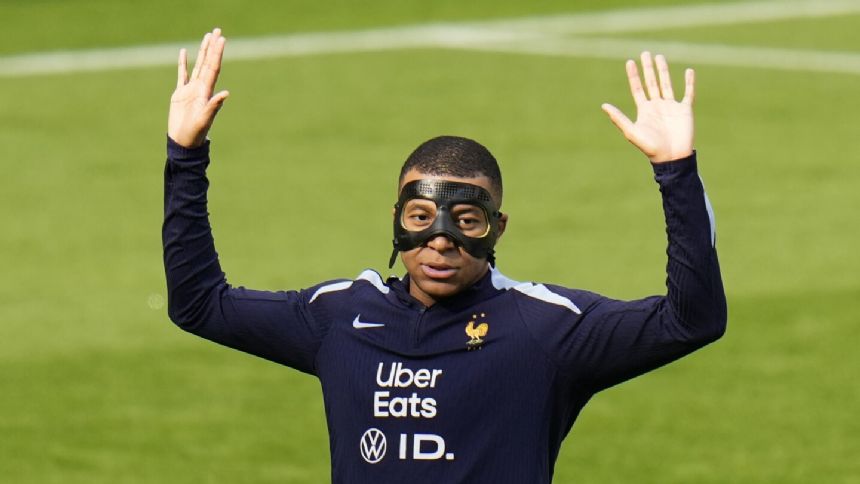 Kylian Mbappe is getting used to his new mask ahead of France's game against Poland, teammate says