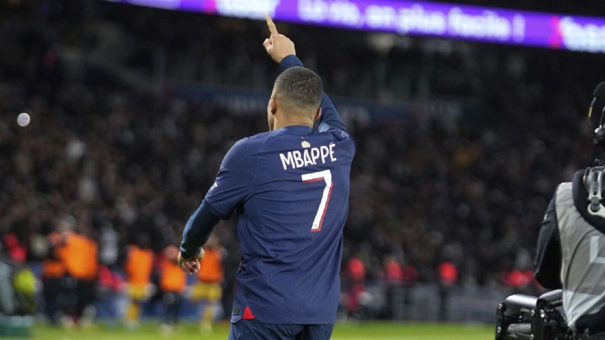 Kylian Mbappe scores twice on 25th birthday as PSG beats Metz 3-1. Ethan Mbappe makes league debut