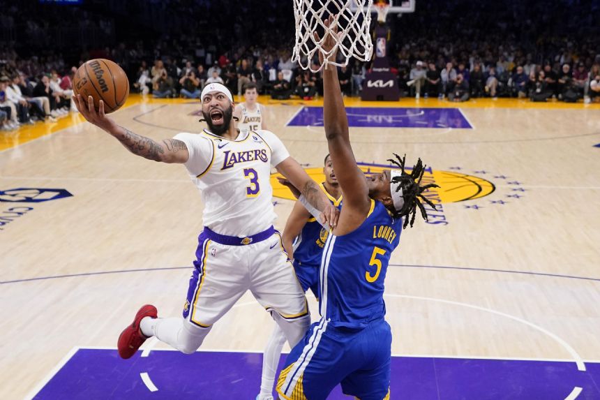 Lakers rout Warriors 127-97; Heat roll in Butler's return