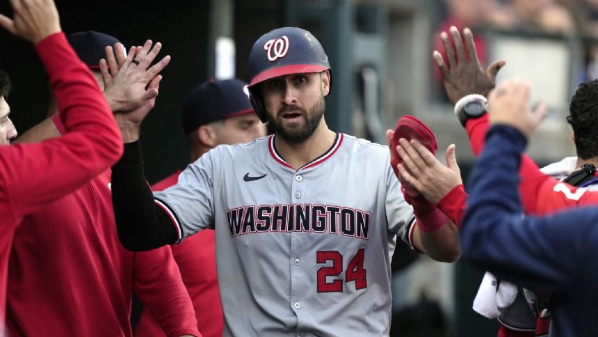 Lane Thomas' 10th-inning sacrifice fly lifts the Nationals over the Tigers 5-4