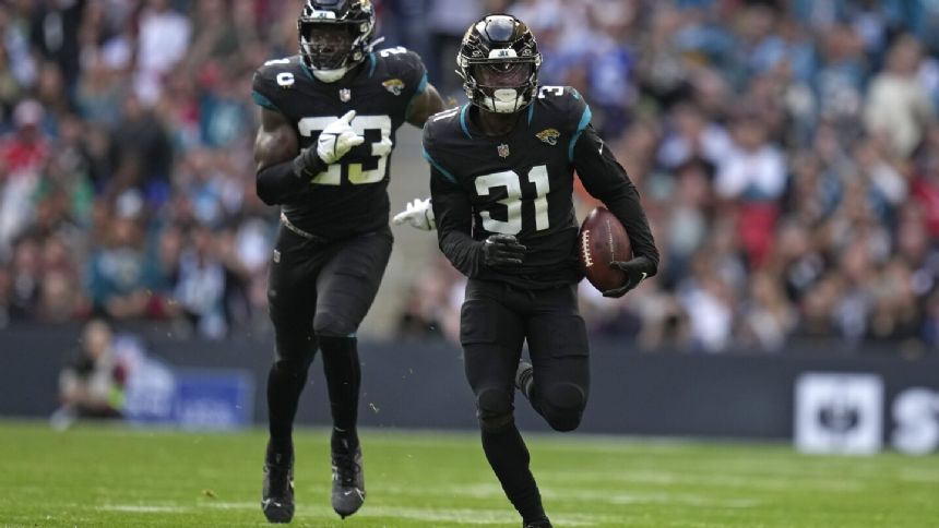 Lawrence, Ridley and defense help Jaguars beat Falcons 23-7 in