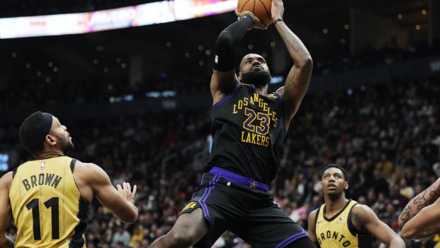 LeBron James scores 23 points as Lakers beat slumping Raptors 128-111