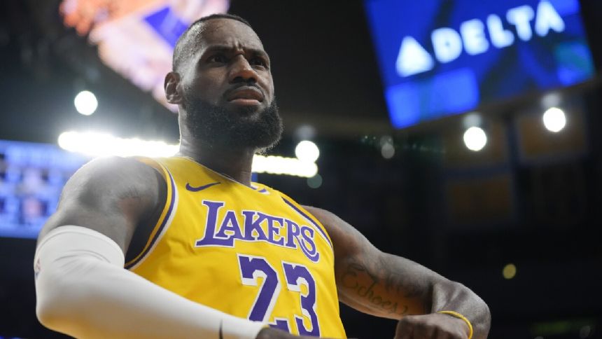 LeBron James sits out Lakers' showdown with Milwaukee Bucks due to his balky ankle