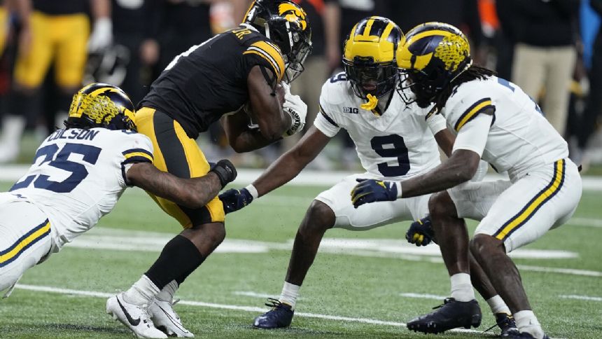 Linebacker Junior Colson of top-ranked Michigan wins Lott IMPACT Trophy
