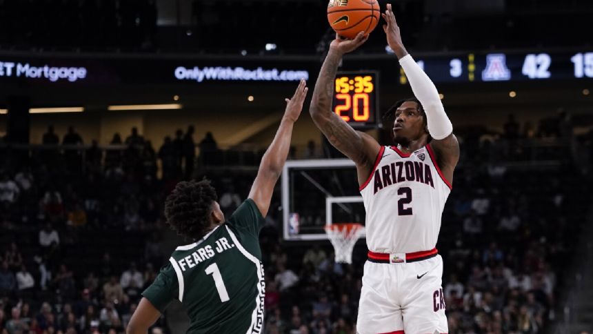 Love's 17 points, key steal in the closing seconds help No. 3 Arizona top No. 21 Michigan State