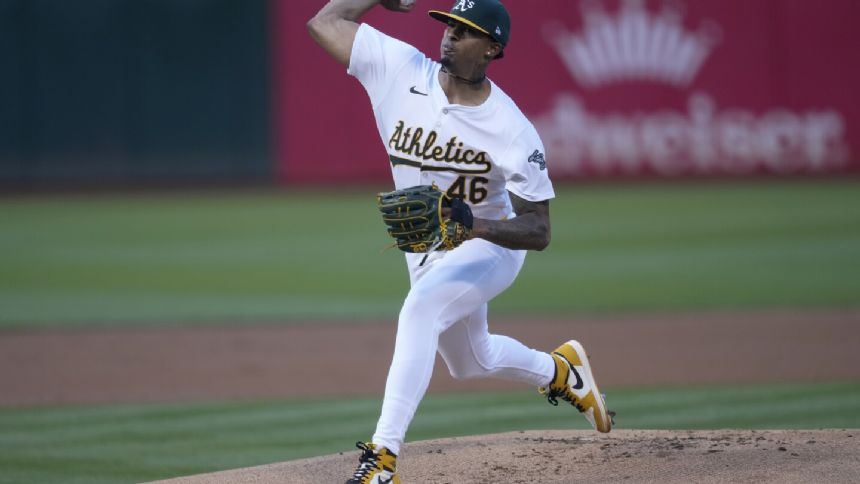Luis Medina gets his 1st win in more than 11 months as the Athletics beat the Royals 5-1