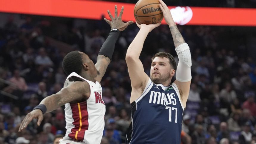 Luka Doncic records fifth consecutive 30-point triple-double in Mavs' 114-108 win over Heat