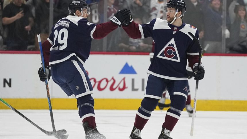 MacKinnon's hat trick lifts Avalanche to a 5-2 win over the Wild