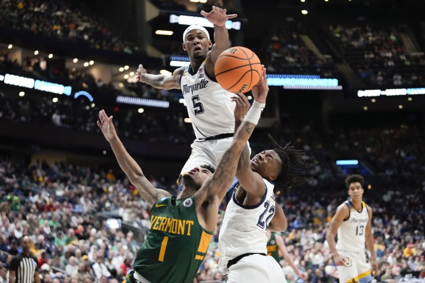 March Madness: Jones, Marquette roll over Vermont 78-61