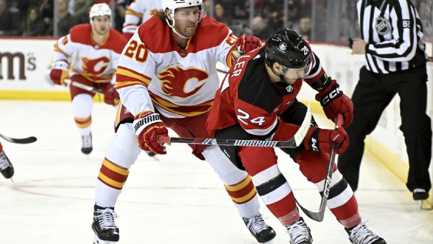 Markstrom makes 37 saves as Flames down Devils 5-3 for their third straight victory