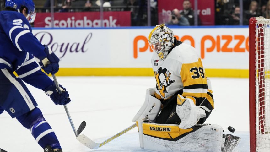 McCabe scores in OT, Matthews gets No. 65 as Maple Leafs beat Penguins 3-2