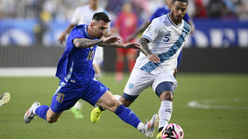 Messi scores twice in return to Argentina lineup in 4-1 win over Guatemala