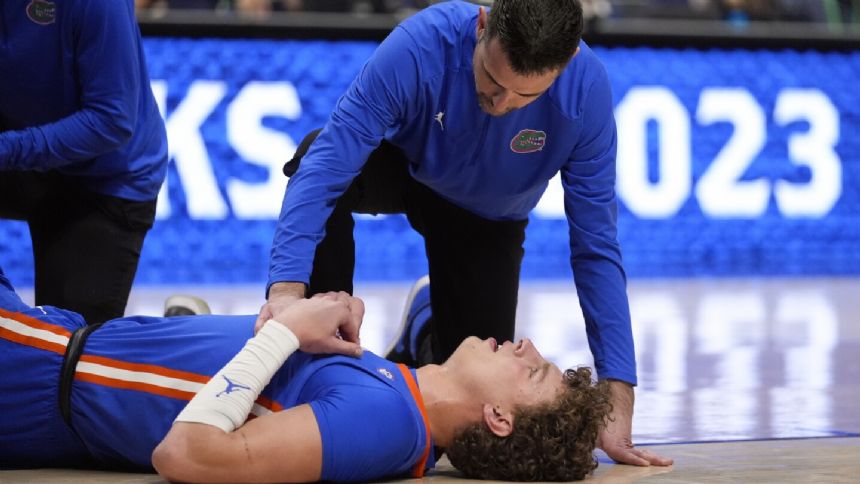 Micah Handlogten will rejoin Florida for NCAA tourney after breaking his leg in the SEC title game