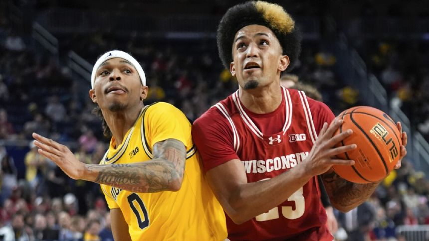 Michigan beats No. 11 Wisconsin 72-68, avoiding another 2nd-half collapse under coach Juwan Howard