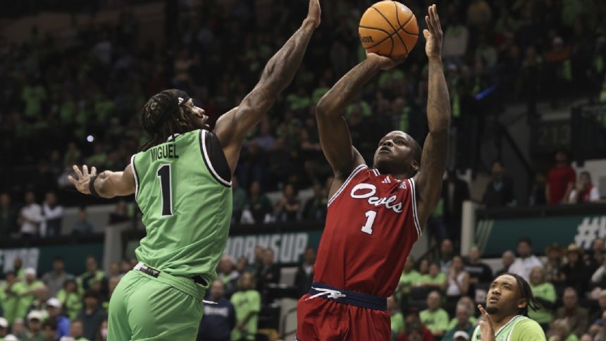 Miguel scores 25 as USF beats No. 24 FAU 90-86 after nearly blowing 25-point lead