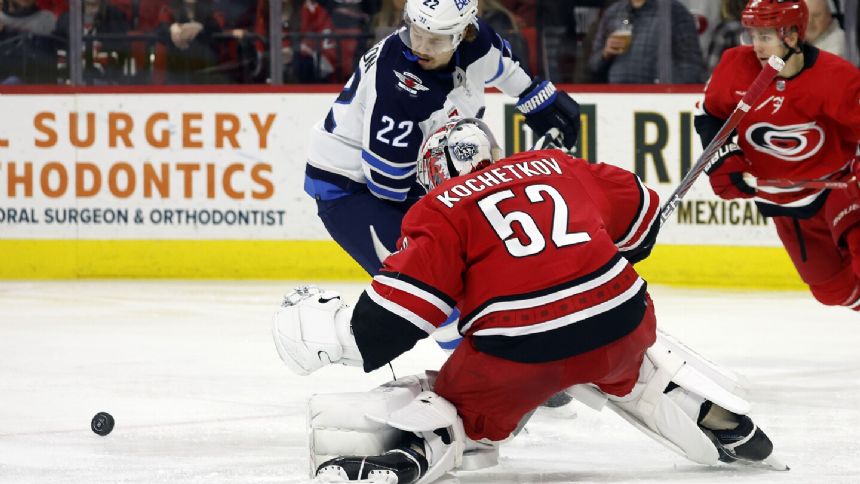 Monahan gets tiebreaking goal as Jets rally from three-goal deficit for 5-3 win over Hurricanes