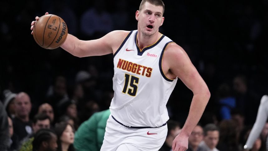 Murray, Jokic help defending champion Nuggets outlast Nets, 122-117