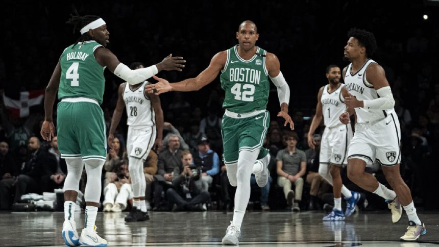 NBA-leading Celtics extend winning streak to 5 games with a 118-110 win over the Nets