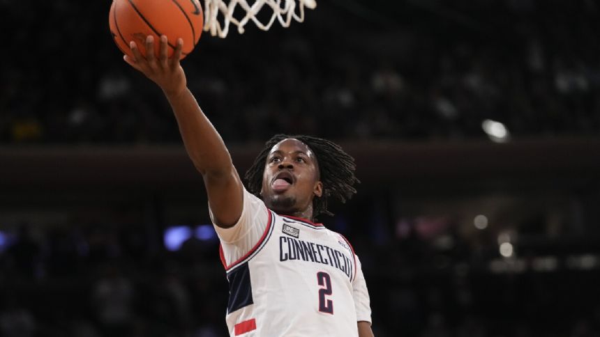 Newton leads No. 2 UConn past St. John's 95-90 and into first Big East title game since 2011
