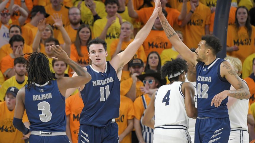 Nick Davidson scores 25 as Nevada snaps No. 22 Utah State's 13-game home win streak, 77-63