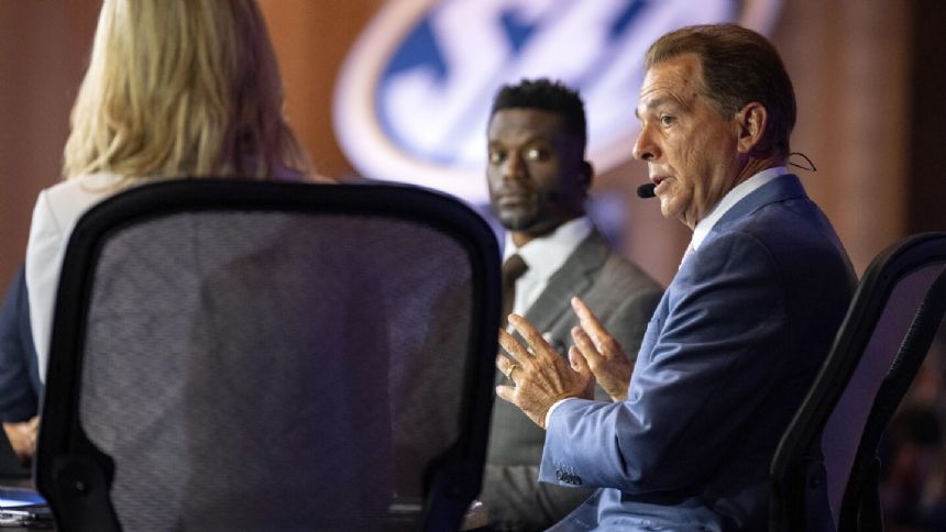 Nick Saban is back at SEC Media Days, six months after retiring and asking the questions now