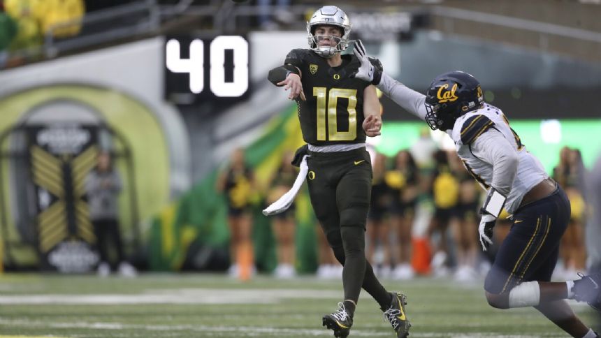 Nix Throws 4 TD Passes And Runs For 2 More Scores In No. 6 Oregon's 63 ...