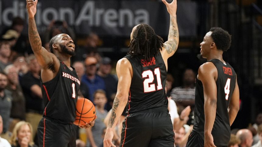 No. 1 Houston beats UCF 67-59 to clinch at least a share of Big 12 title in 1st season in conference