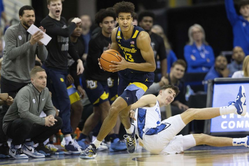 No. 10 Marquette survives wild finish, beats No. 19 Bluejays