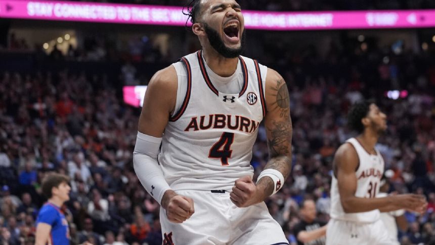 No. 12 Auburn goes wire-to-wire to beat Florida 86-67 for SEC Tournament title