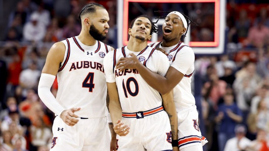 No. 13 Auburn routs No. 11 South Carolina 101-61 for its biggest blowout of a ranked opponent