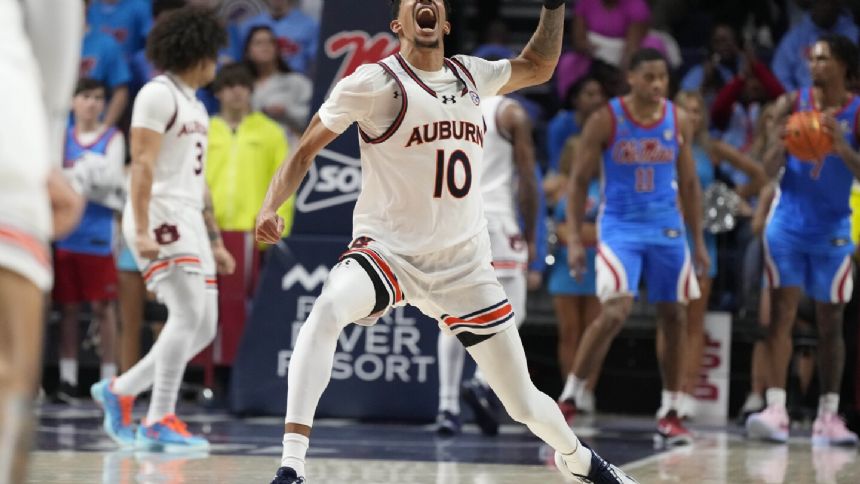 No. 16 Auburn uses big second half to rally from first-half deficit and top Mississippi 91-77